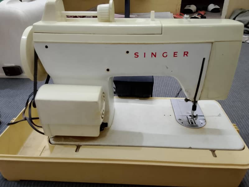 Singer Sewing Machine

                                                            alt=