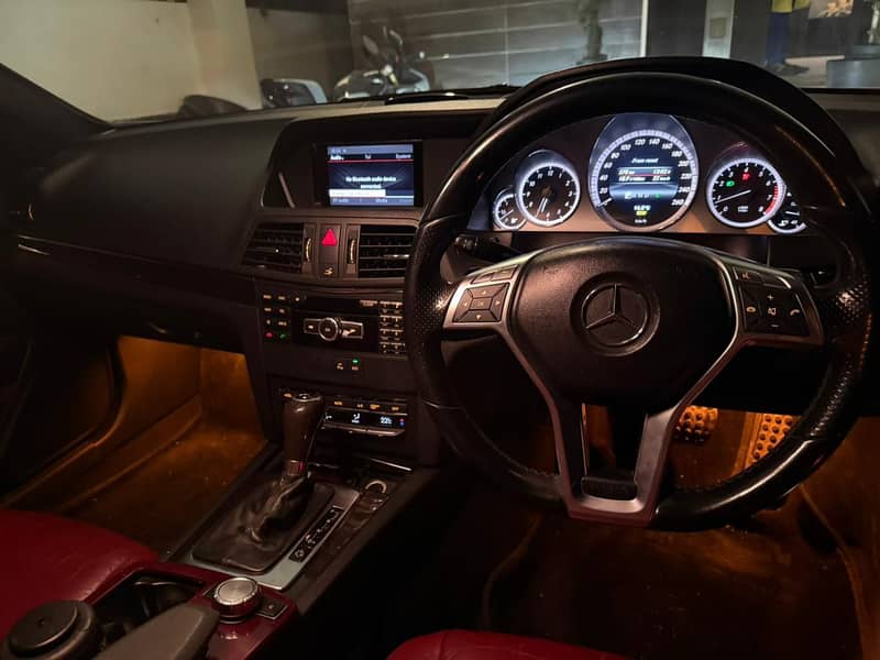 Mercedes Benz E200 AMG Coupe Year - 2013

                                                            alt=