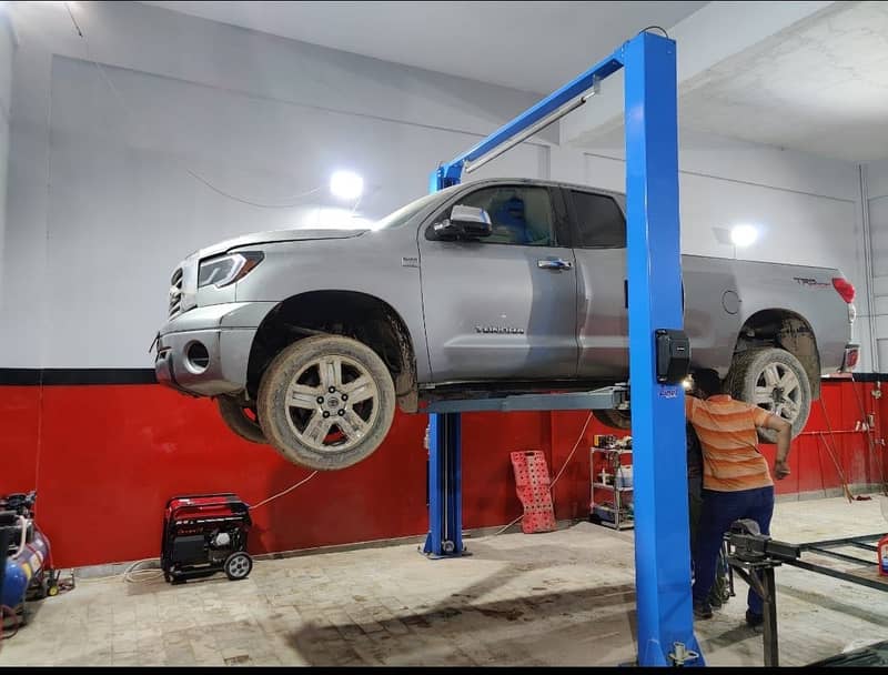 Car two post lift clear floor

                                                            alt=