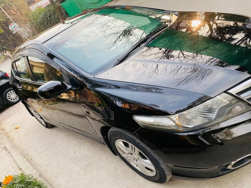Honda City IVTEC 2014 mode, manual tranismission, islamabad registered

                                                            alt=