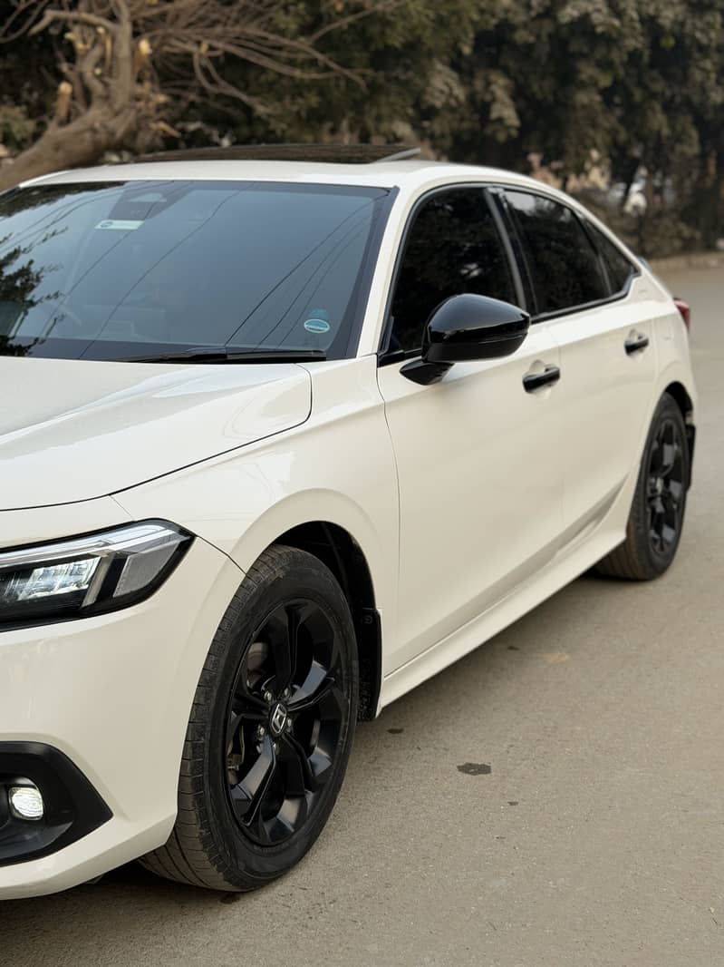 Honda Civic RS 2023

                                                            alt=