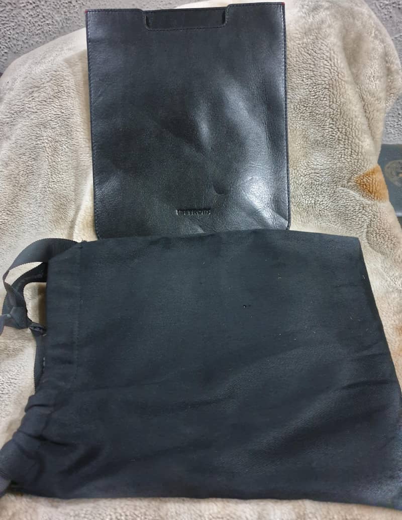 Leather ware Tablet pocket cover

                                                            alt=