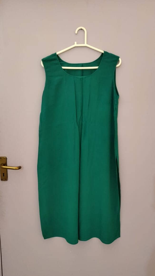 Beautiful Bottle Green Gown

                                                            alt=