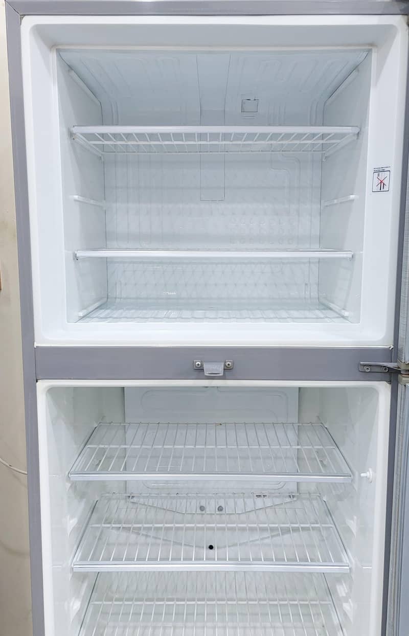 Dawlance Medium size Fridge for sale. Excellent condition.

                                                            alt=