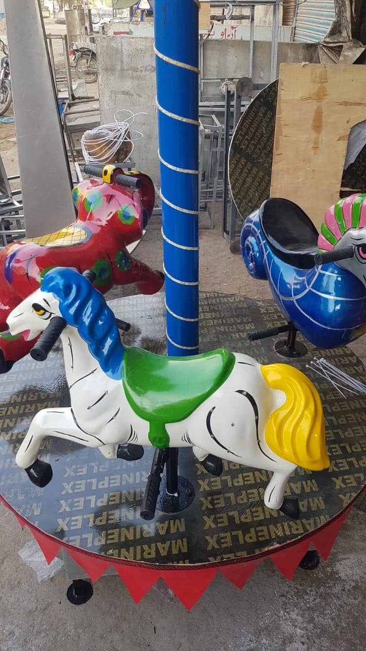 Jumping castle / slides / jhuly / kiddi ride / kids / games / park rid

                                                            alt=