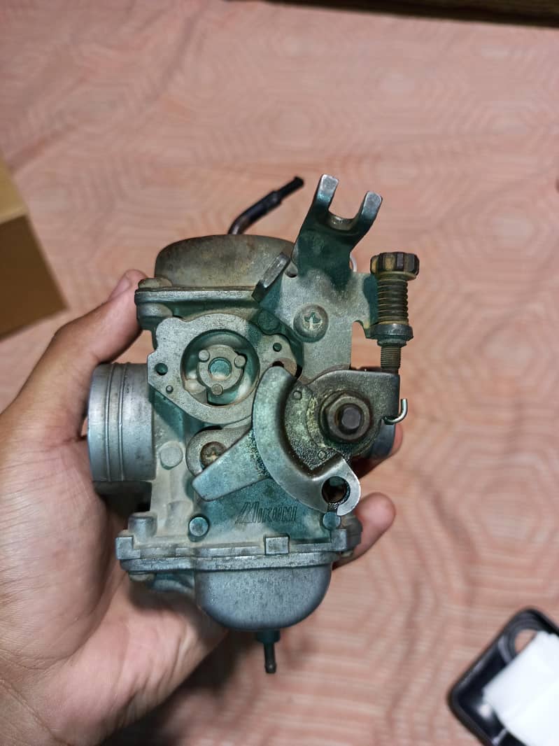 Suzuki 110 Carburator

                                                            alt=