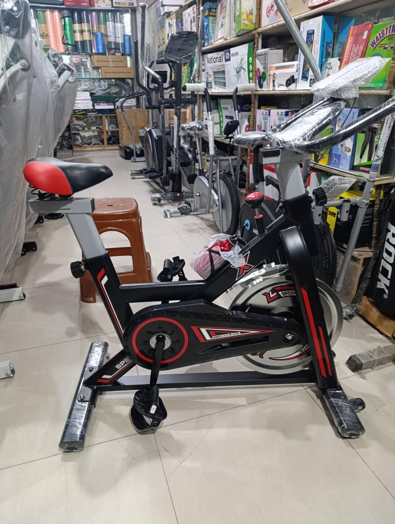 spinning bike 120kg capacity with adjustable resistance box pack

                                                            alt=