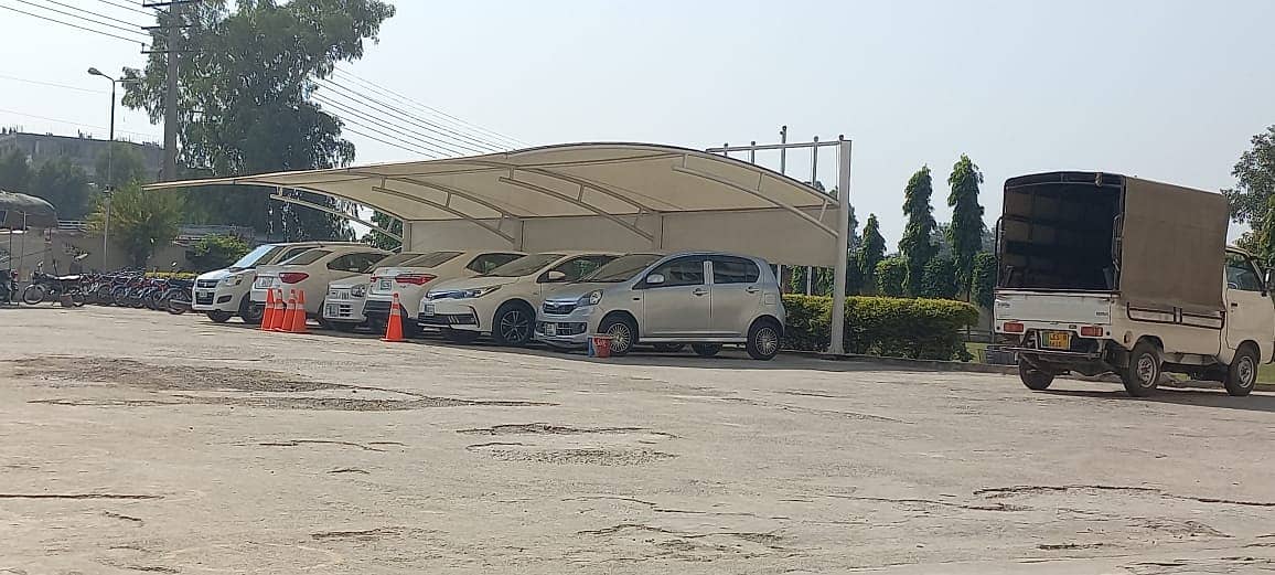 Car Parking Structure , Tensile Fabrics , Wall Mounted , Canopy sheds

                                                            alt=