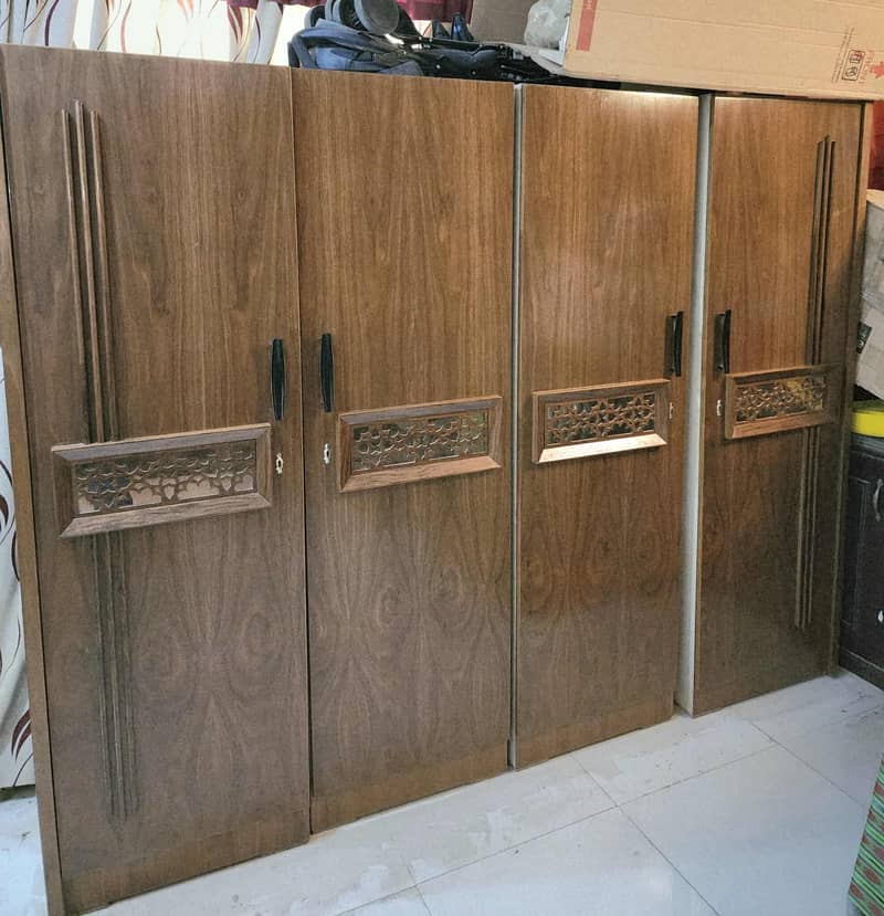 Master Bed + Dressing + Four Door Cupboard

                                                            alt=