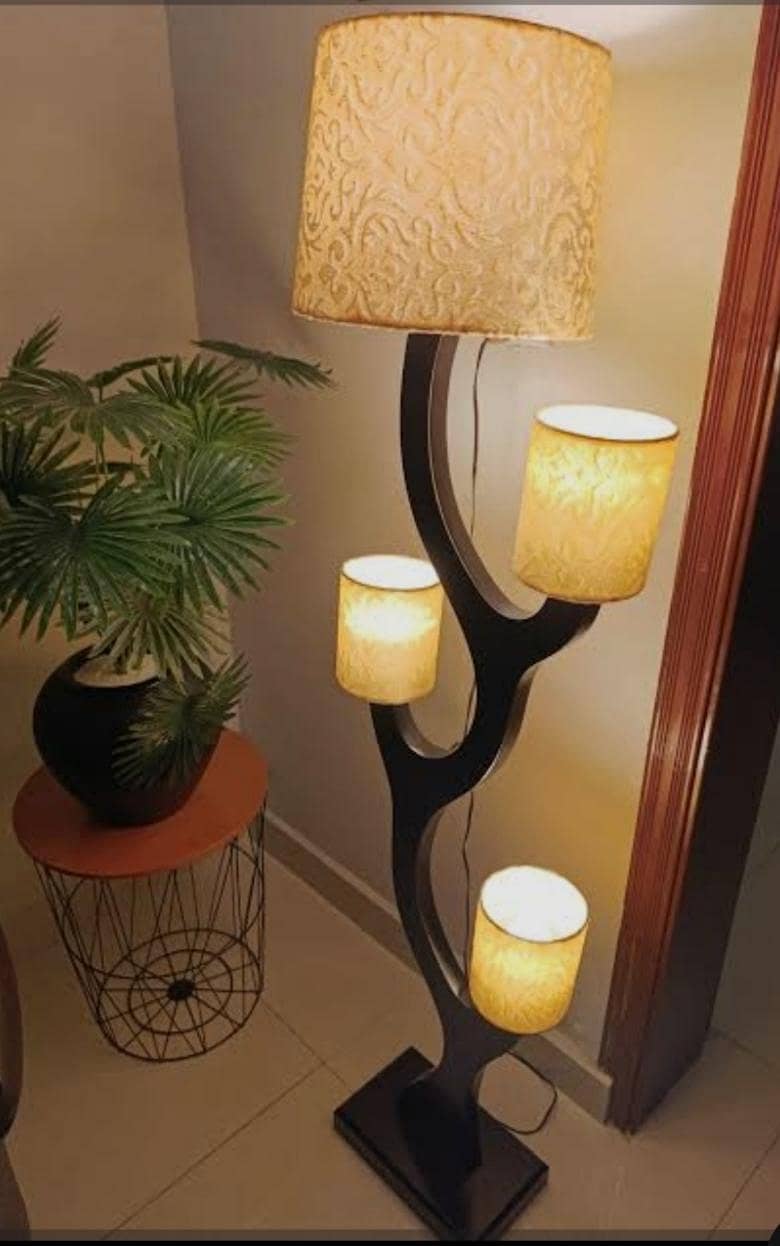 Tree type four shade floor lamp

                                                            alt=