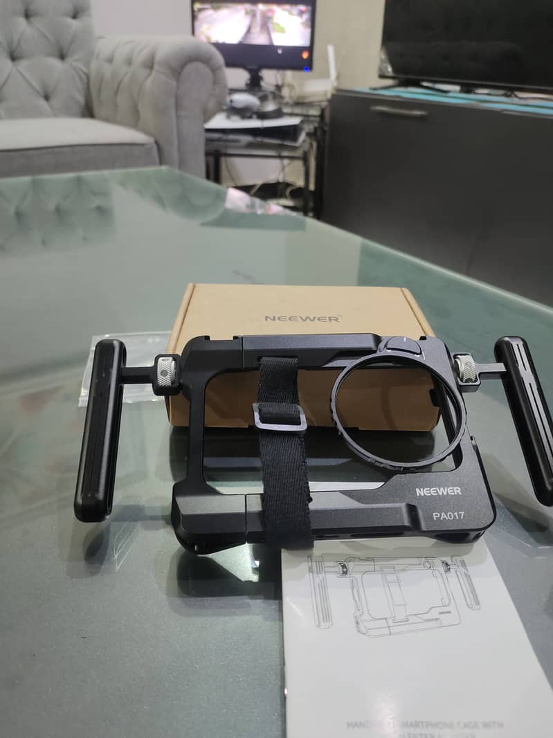 Neewer Handheld Smartphone Holder with 67mm Filter adapter | for sale

                                                            alt=