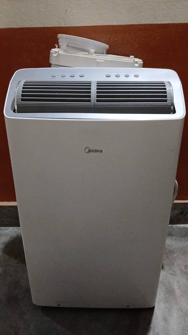 Midea Portable AC| Used Midea AC| 1.2 Ton AC|Portable Air Conditioner

                                                            alt=