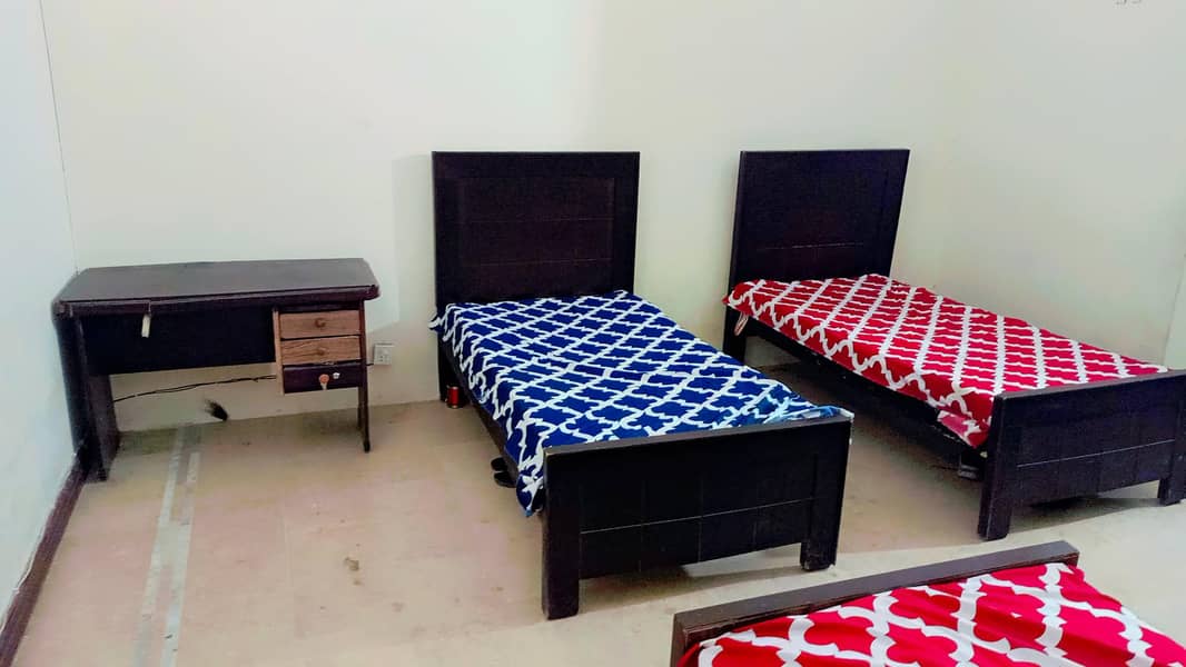 ZA Boys Hostel/Living space/Accomodation/Room in E11